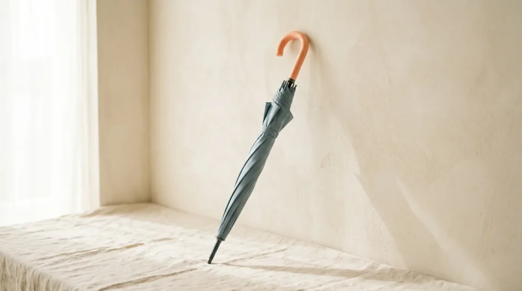 Closed blue-grey umbrella