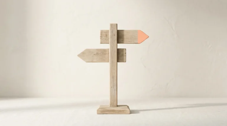 Wooden signpost with two pointing arms